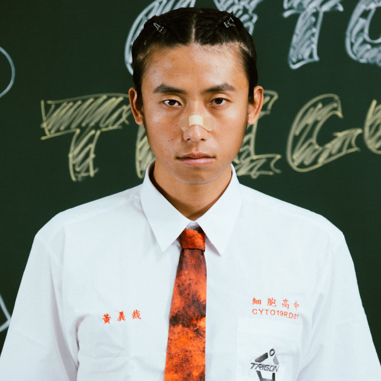 黃義裁